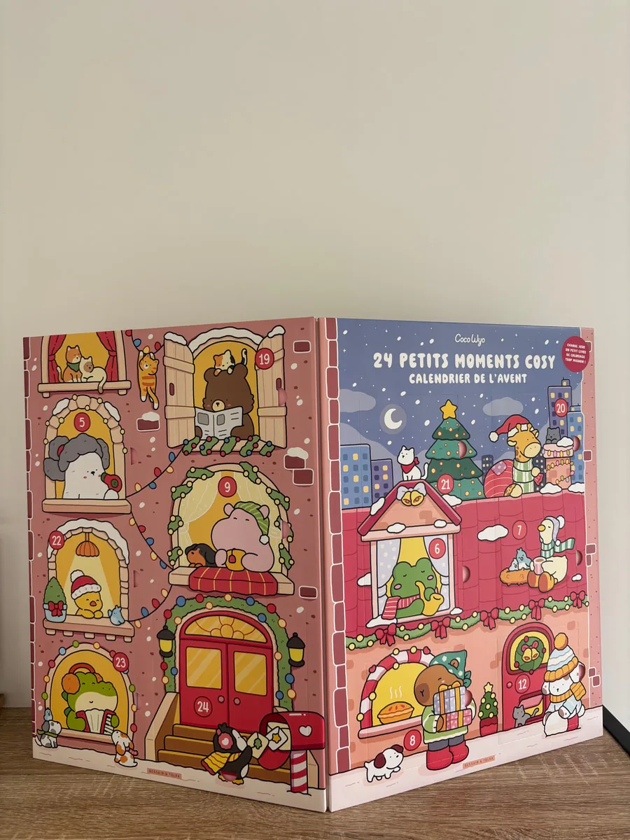 Open French Coco Wyo advent calendar, showing numbered doors on a Christmas house illustration