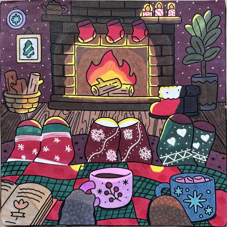Coloriage cosy avec feu de cheminée, chaussettes, plaid et boissons chaudes